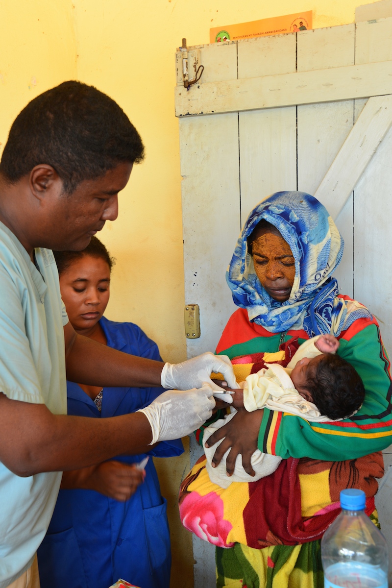 A child is vaccinated for tetanus during a UNICEF-supported vaccination drive in Madagascar.