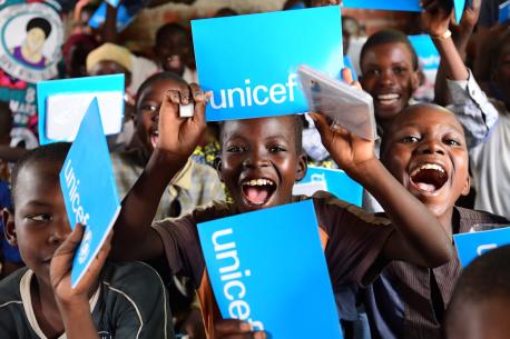 Children are happy they received new notebooks from UNICEF, in Ndjamena, the capital of Chad.