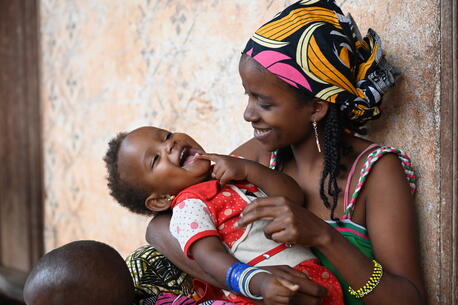 In Bertoua, eastern Cameroon, 23-year-old Houreratou Abdoulay cuddles her youngest child Awaou.