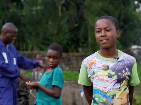 A new water treatment plant in Kiziba, DRC means girls like Ester, 12, don't have to miss school to fetch their family's daily water supply.
