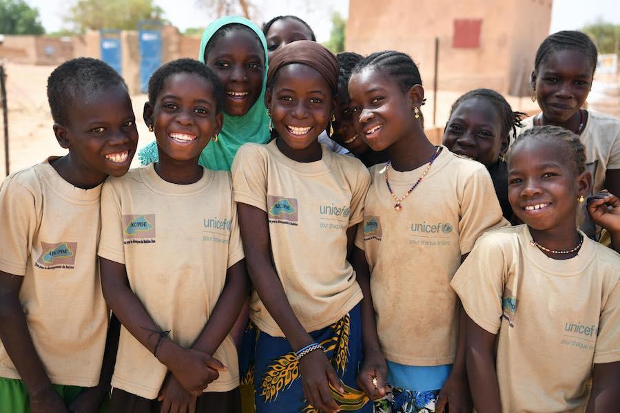 UNICEF Child-Friendly spaces help displaced children like these boys and girls from conflict-ridden Burkina Faso.