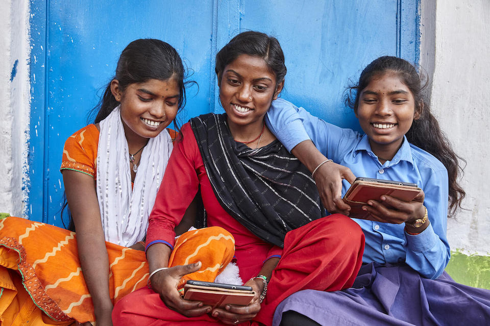 Rupa, Sonam and Kajal Kumari explore learning through digital literacy at school, Madhyamik Vidyalaya, Bajitpur, Kalyanpur Panchayat, Patna, Bihar, India.