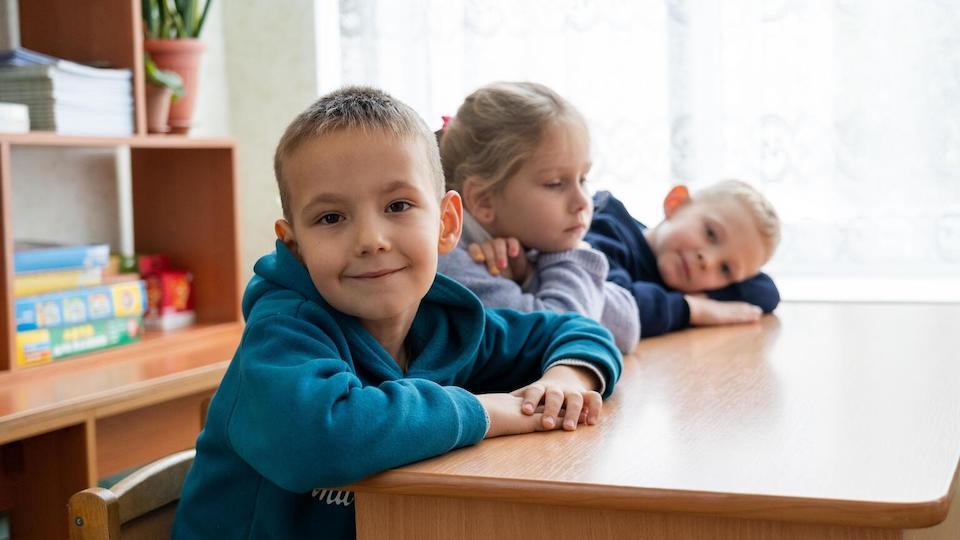 Children are back in school in Vasylkiv, Ukraine, in November 2023, after UNICEF financed repairs to local water and sanitation systems. 