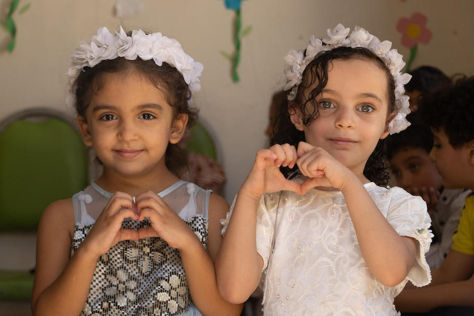 Four-year-olds Khadija, left, and Mariam attend a mental health and psychosocial support session expressing emotions and feelings at a UNICEF-supported center in Qastal Mesht, Aleppo city, Syria, on Sept. 26, 2023. 