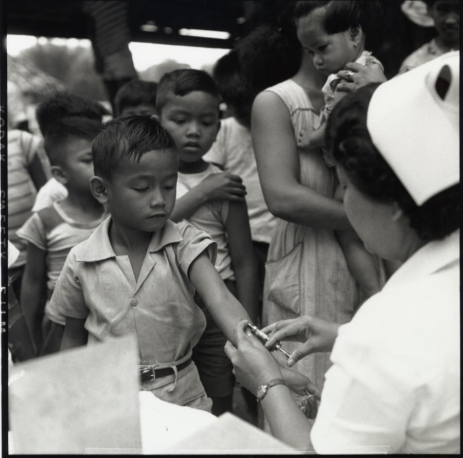 A boy receives the anti-tuberculosis vaccine during a UNICEF-supported campaign in The Philippines in 1952.