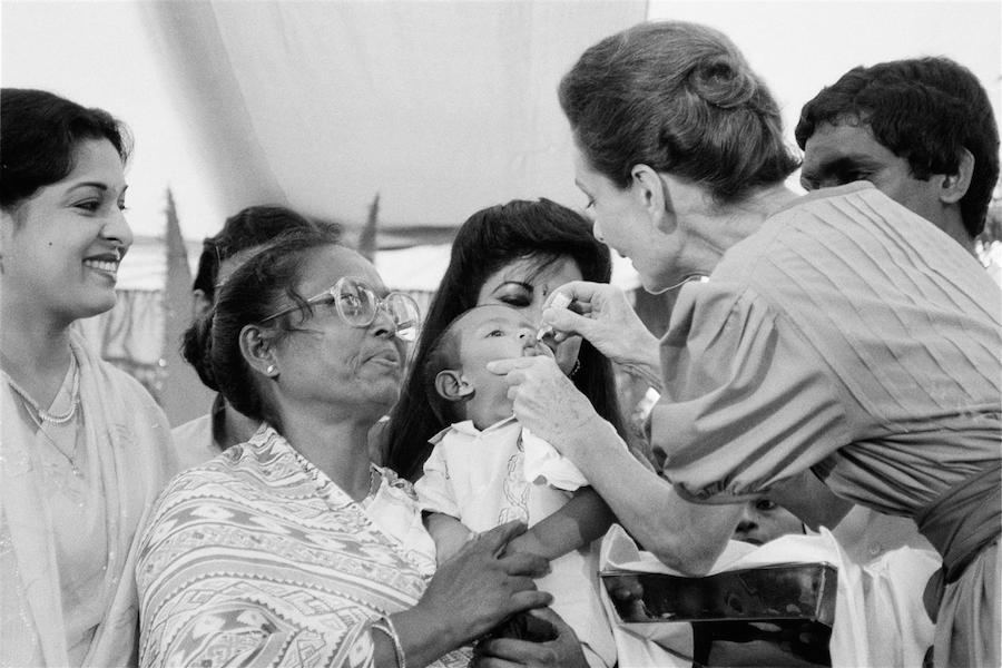 Bangladesh, 1989: UNICEF Goodwill Ambassador Audrey Hepburn vaccinates a child against polio at a UNICEF-supported health clinic.