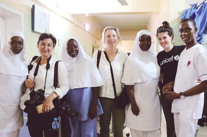 Erica Vogel of UNICEF USA with Lynsey Addario and Aryn Baker from TIME posing with health workers in Borno State, Nigeria.