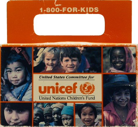 A Trick-or-Treat for UNICEF box with many children's faces printed on the side.