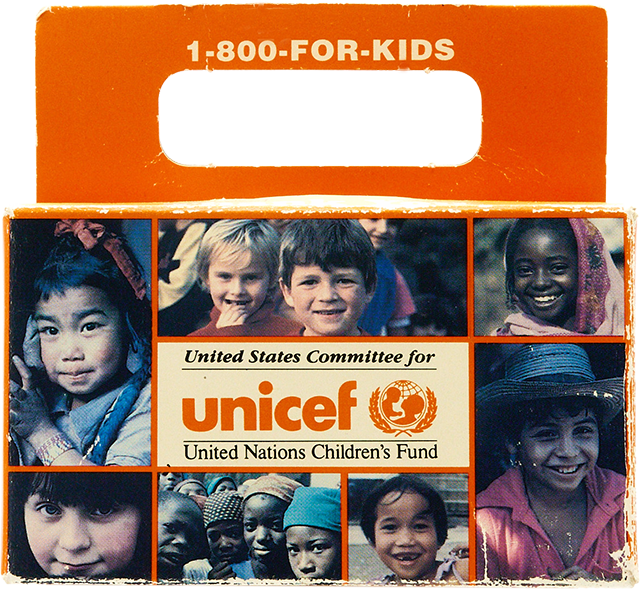 A Trick-or-Treat for UNICEF box with many children's faces printed on the side.