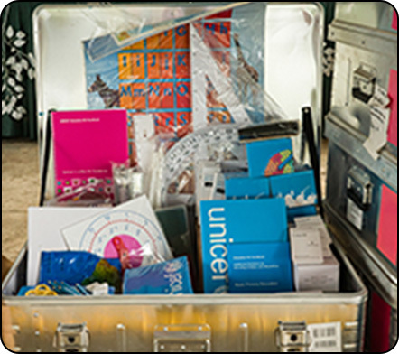 A box containing many kinds of UNICEF's school supplies.