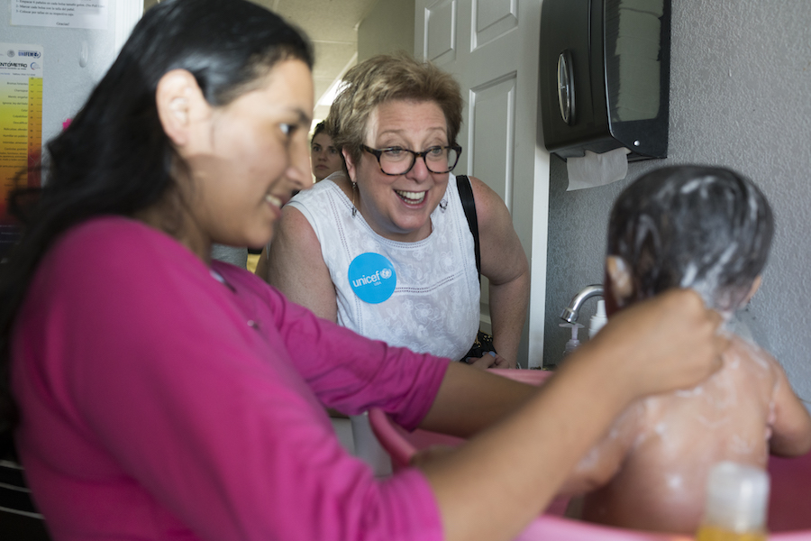 UNICEF USA President and CEO Caryl Stern met with mothers and children at a shelter for Central American migrants during a visit to the U.S.-Mexico border in July 2018.