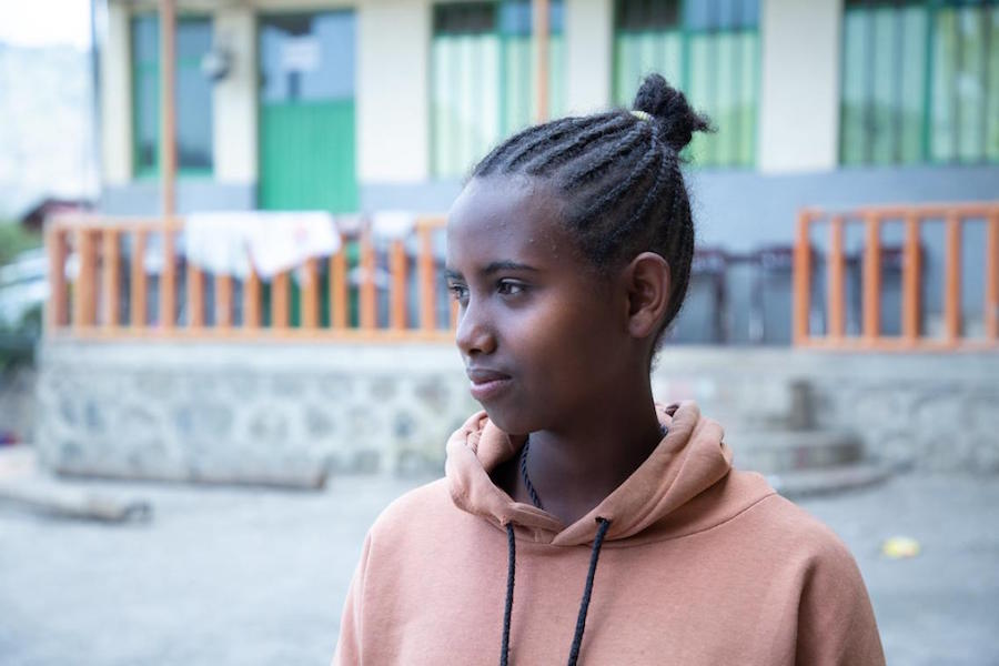 Conflict in Ethiopia forced Meseret, 16, to flee with her two younger brothers, leaving their mother behind. 