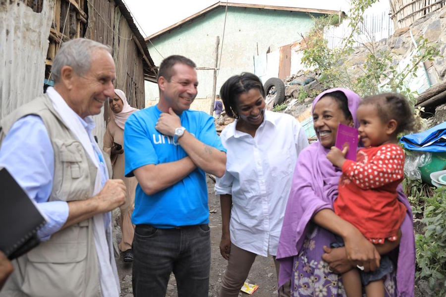 On a recent visit to Dessie town in Ethiopia's Amhara region, Rania Dagash, UNICEF Deputy Regional Director for Eastern and Southern Africa (in white shirt) met baby Rahima and her mother, Amina, who adopted her after finding her abandoned as a newborn. 