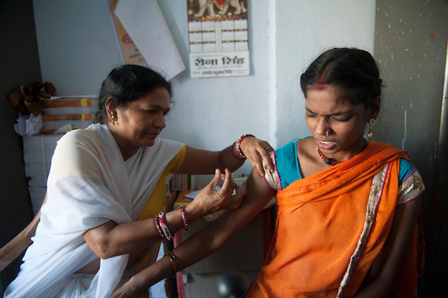 A pregnant woman being vaccinated against maternal neonatal tetanus (MNT) in India with UNICEF.