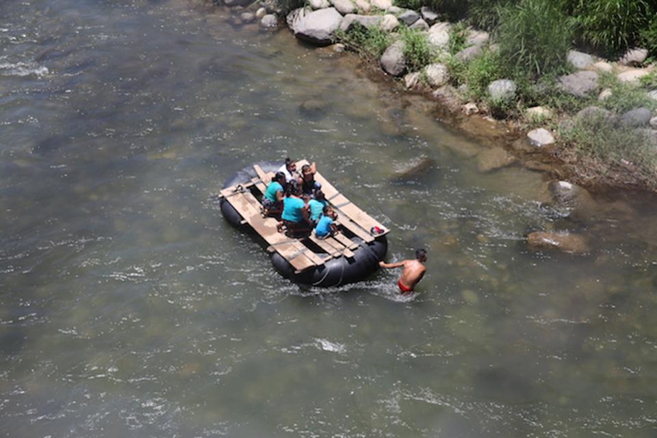 The crossing from Guatemala to Chiapas, Mexico. The official border is within view, yet there&#039;s a constant flow of families without papers being led across the border by coyotes. 