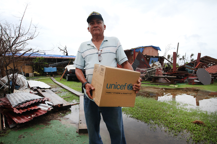 After Hurricane Maria damaged his house and knocked out his power and water supply, Gulf War veteran Rafael Torres received a family hygiene kit from UNICEF.