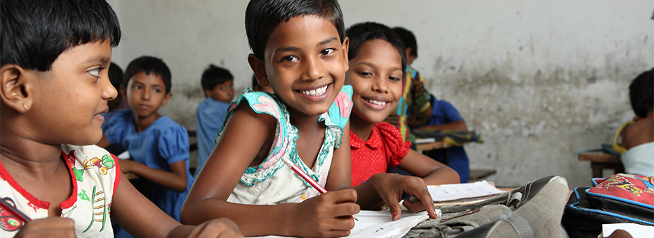 Students from the first grade work on their Mathematics skills at Bairy Harin Mary Government Primary School at Palashbari, Gaibandha on 5 September 2013.