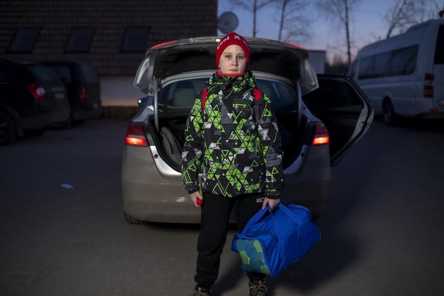 Fleeing war in Kharkiv, 9-year-old Danylo packed toys for his baby sister and left his own belongings at home. 