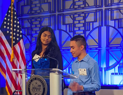 Daniella Jacob, a summer intern in the Houston Mayor's Office of Education and one of UNICEF USA's Central Plains advocacy leads, left, listens as Alexavier Mendoza, speaks on his experience serving on the Houston Child Friendly Cities Initiative Youth Co