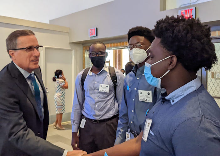 At an event celebrating Houston's designation as a UNICEF Child Friendly City candidate on August 11, 2022, UNICEF USA President & CEO Michael J. Nyenhuis, far left, meets youth who participated in the development of Houston's CFCI Local Action Plan.