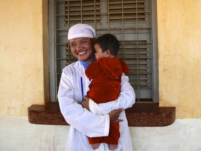 Vaccinations, routine visits to health centers and education are keeping mothers and children, like this baby, safe.