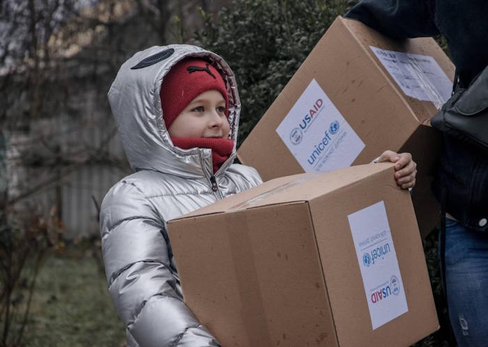 In Kotlyareve, Mykolaiv region, Ukraine, children were thrilled to open a box from UNICEF containing warm winter clothes. 