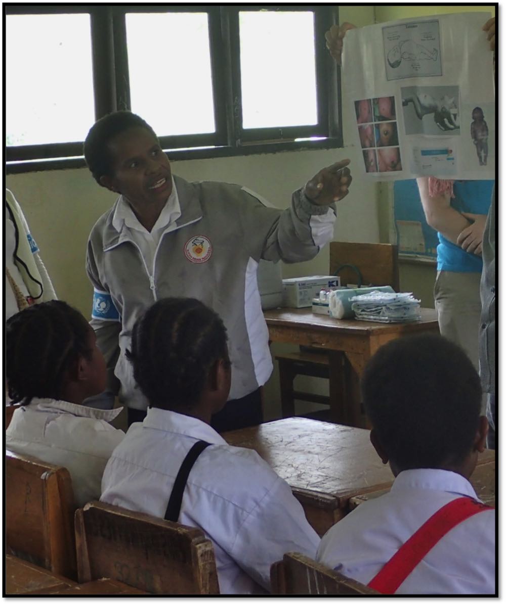 A health worker in a remote area of Papua, Indonesia, instructs on the how-to&#039;s of hygienic birthing practices. © UNICEF/Westfall