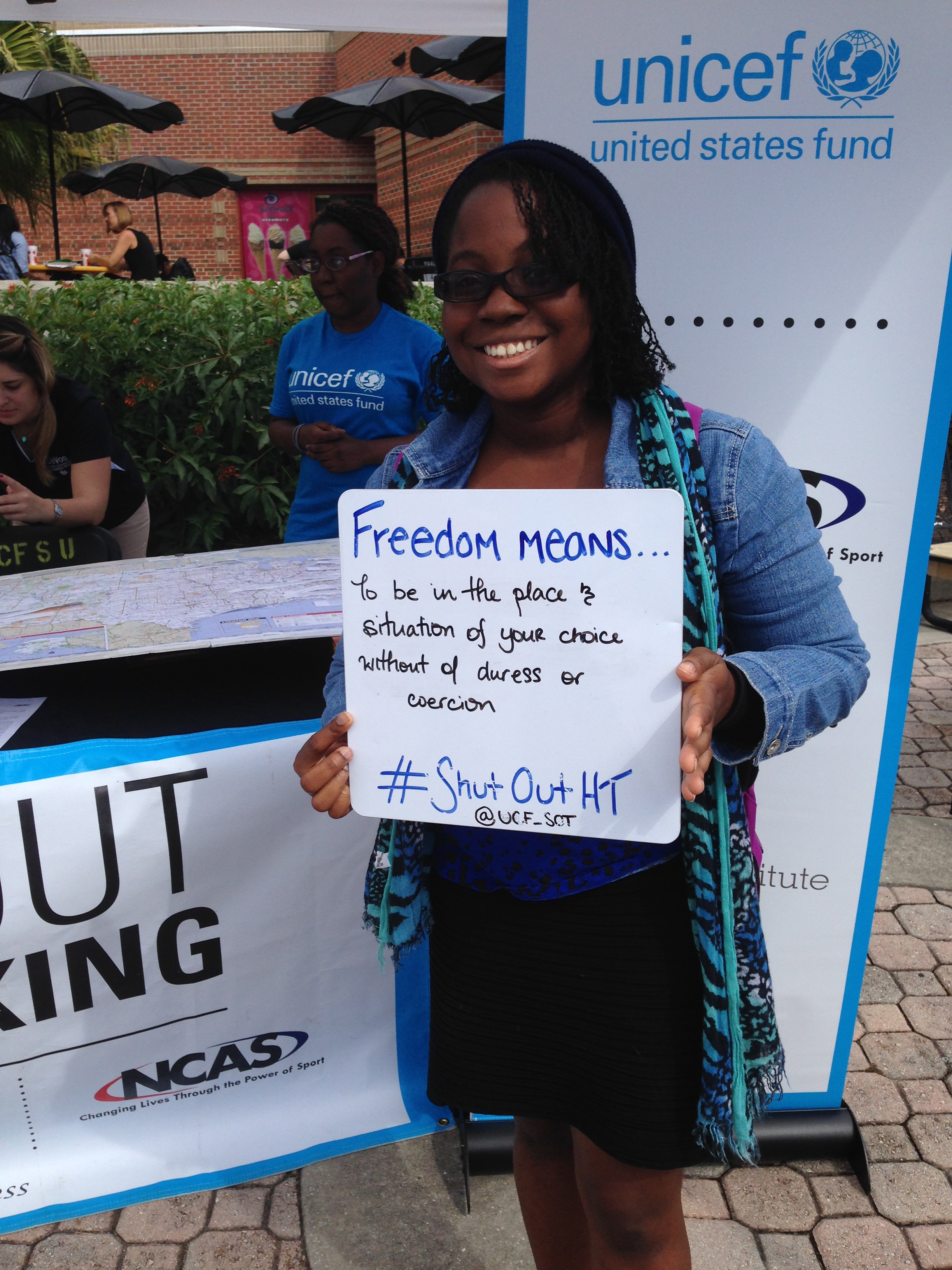 A UCF student poses for a Shut Out Trafficking photo campaign. Photo credit: Emily Pasnak-Lapchick