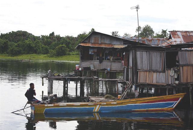 Houses over water in Indonesia.