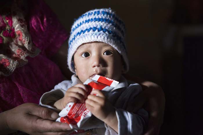 A child in Guatemala is fed ready-to-use therapeutic food (RUTF), provided by UNICEF, to help stave off malnutrition