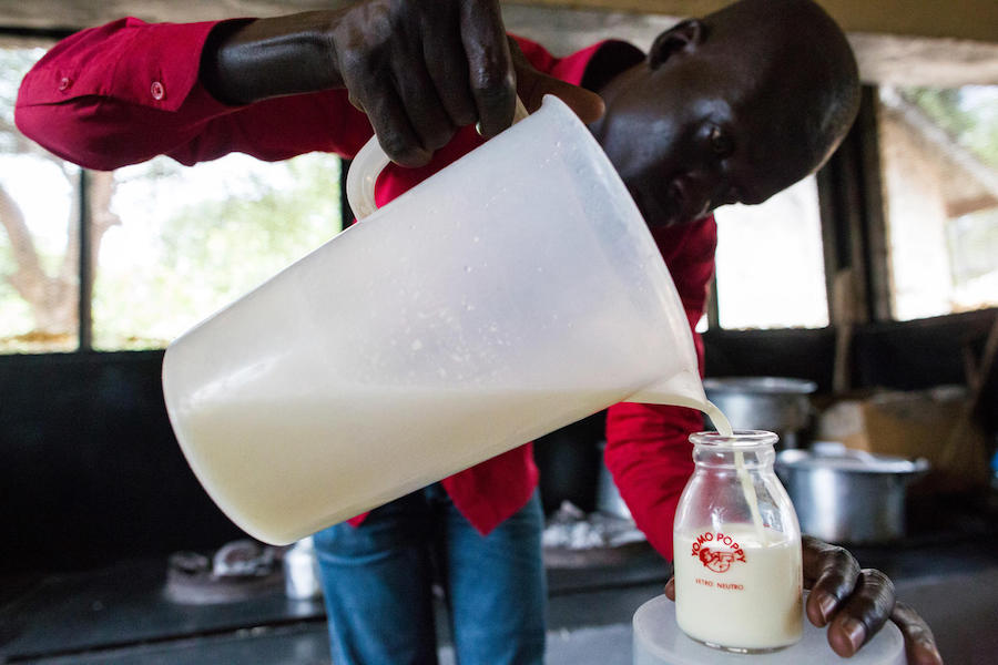 t a UNICEF-supported hospital in Juba, South Sudan in October 2017, a nutritionist prepares therapeutic milk rich in nutrients for children suffering from severe acute malnutrition. 
