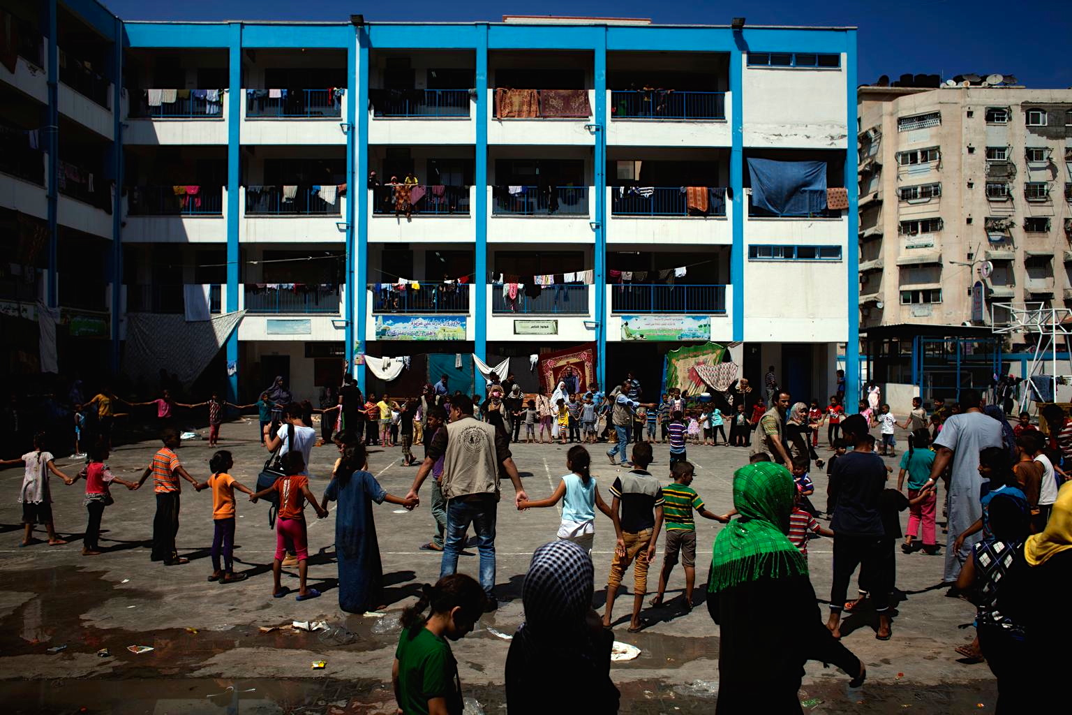 Nearly 237,000 people have sought shelter inside UN-run schools in Gaza since the recent conflict began. © UNICEF/NYHQ2014-1041/d’Aki