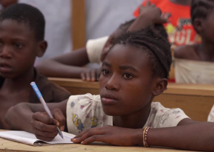 In Kikumbe, Democratic Republic of Congo, Nyota, 13, attends school through a program delivered by UNICEF with funding from Education Cannot Wait.