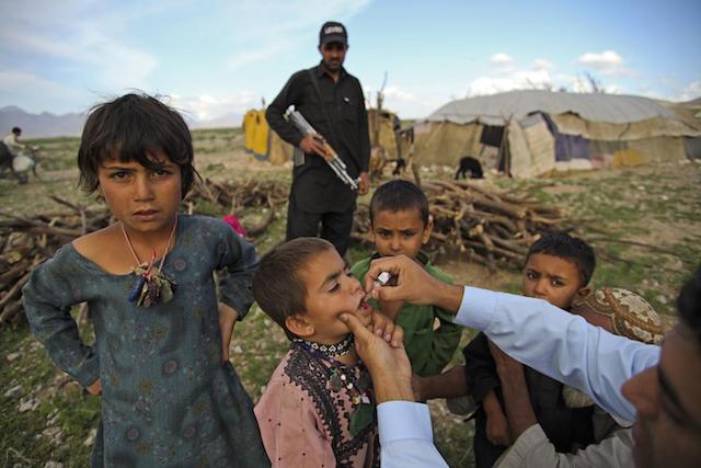 During a door-to-door national immunization campaign, a polio team vaccinated migrant children living in Quetta, the capital of Baluchistan province, Pakistan. During a door-to-door national immunization campaign, a polio team vaccinated migrant children living in Quetta, the capital of Baluchistan province, Pakistan.