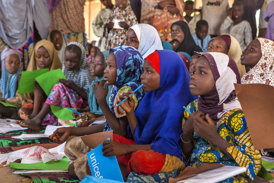 Class is in session at a UNICEF-supported safe space for children in a camp for internally displaced people in Maiduguri, Nigeria.  