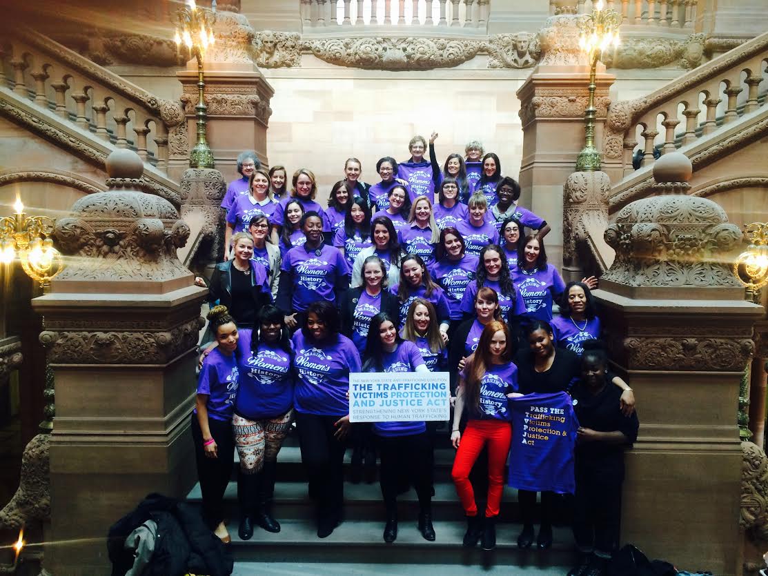 Members of the New York Anti Trafficking Coalition, Survivors, and Activists celebrate the victory of the TVPJA