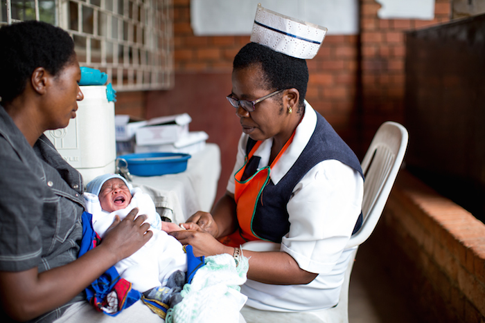 An infant is vaccinated at a UNICEF-supported clinic in Lusaka, Zambia.