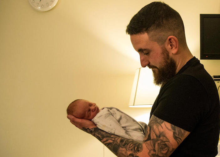 Alex Edmonds Brown holds his son Harley James, born premature, in a private room in the maternity ward of the Royal Devon and Exeter Hospital, in Exeter, Devon, England on February 28, 2018.