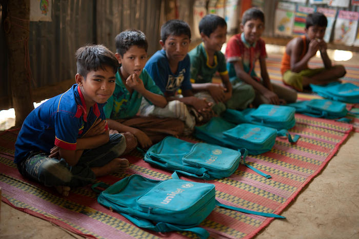 Rohingya refugee children study English in the UNICEF-supported CODEC Meghna Learning Center in Leda Makeshift Camp, Cox's Bazar District, Bangladesh in April 2018.