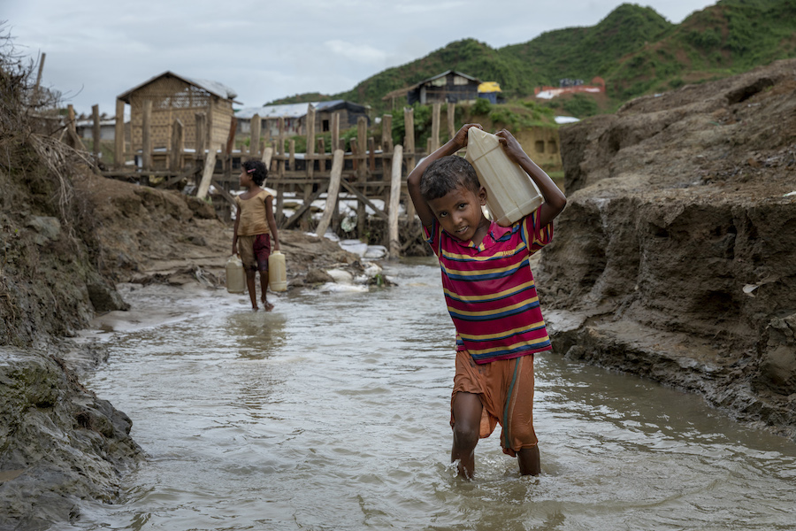 Bibi, 10, fetches water twice a day for his family in Cox's Bazar, Bangladesh, where UNICEF and partners are working to improve access to clean water for Rohingya refugees living in camps and the surrounding host community.