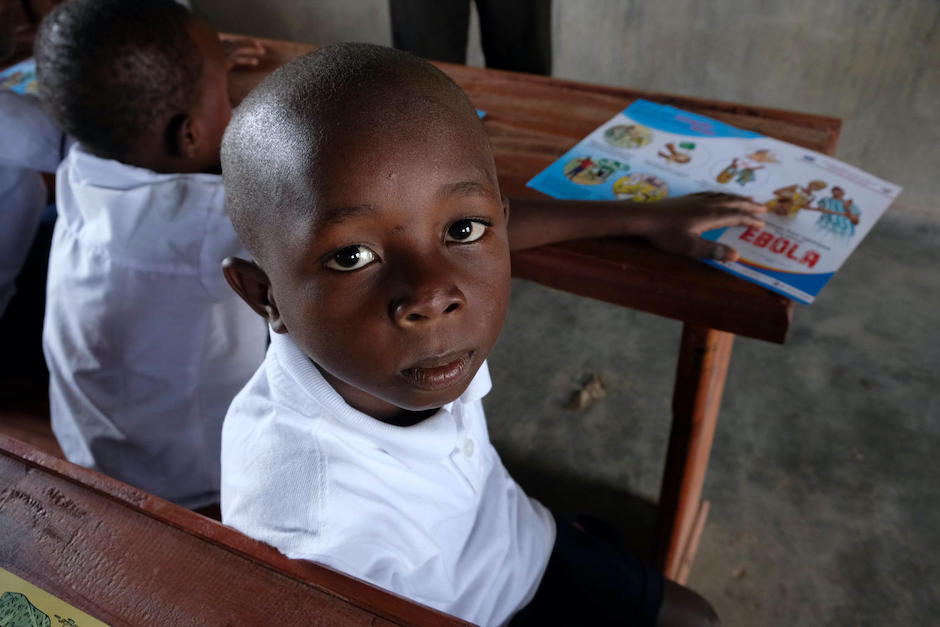 Kambale, 7, from Beni, DRC, learns the importance of washing hands to stop the spread of Ebola. Kambale, 7, from Beni, DRC, learns the importance of washing hands to stop the spread of Ebola.