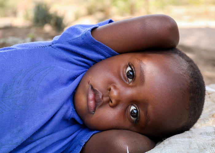 The family of 2-year-old Evans benefited from the UNICEF-supported Nutritional Improvements through Cash and Health Education (NICHE) program in Kitui, Kenya.