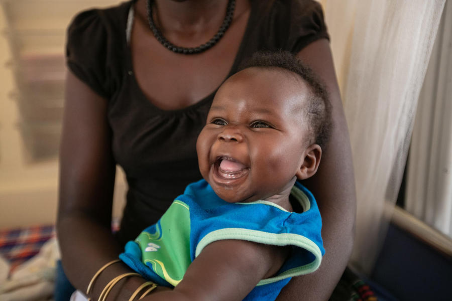 A healthy smiling baby in Mabilatuk HC IV, Kaabong District, Uganda in 2019. 