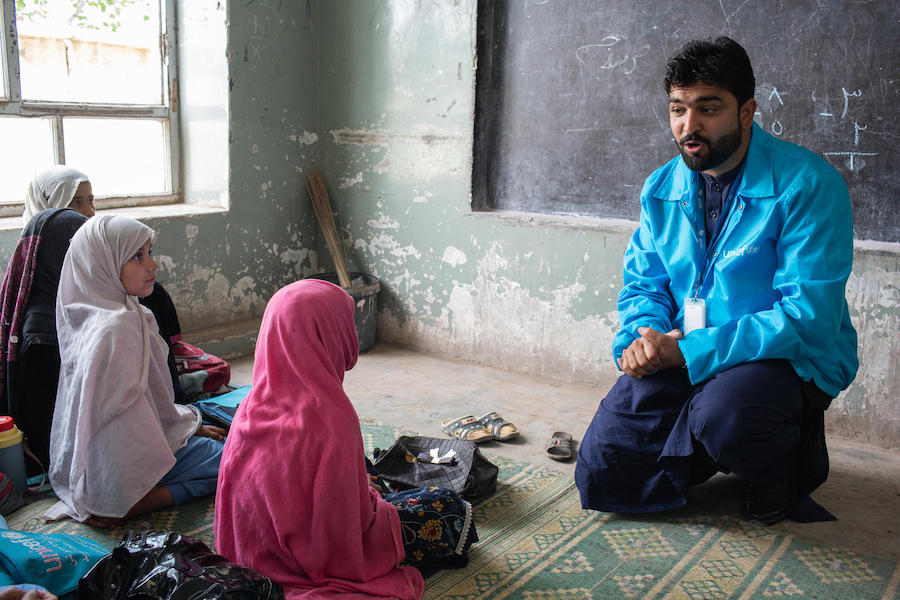 UNICEF Education Officer Masood Nassir talks to a class of young women at Peer Sayed Ahmad Gilani School in Surkhrod district, Nangarhar province, Afghanistan in April 2019.