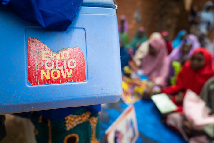 Volunteer vaccinators in Nigeria carry polio vaccines in cold boxes like this one as they go door to door to immunize children.