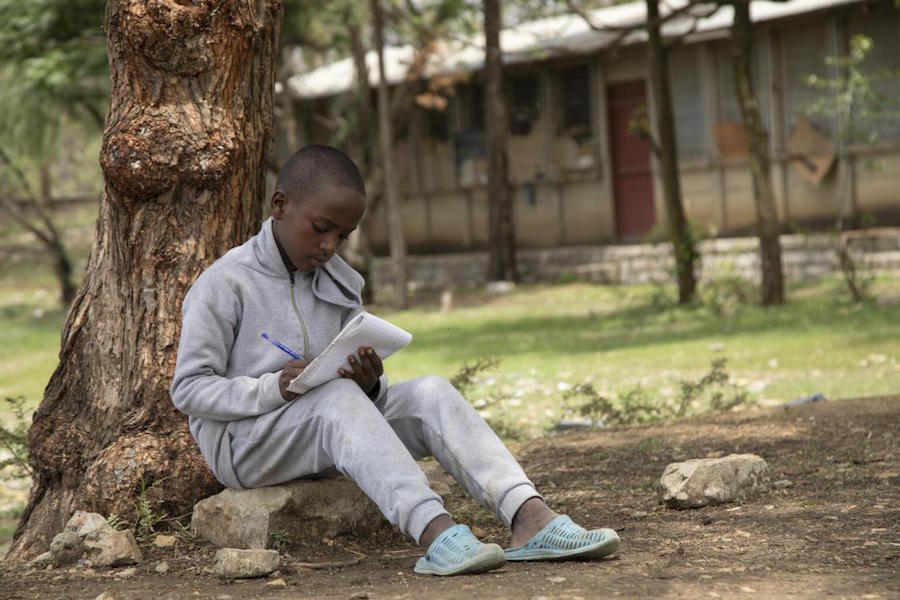 Forced from their home by conflict, Temesgen, 11, and his family are living in an IDP camp in a school-turned-emergency-shelter in Mekelle, Ethiopia in 2021.