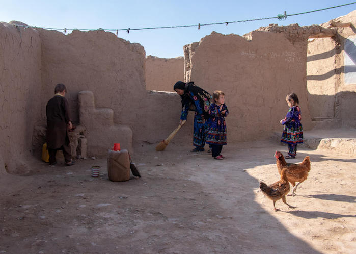 Parwana and family at their home in an IDP camp outside Herat, western Afghanistan, in 2021. 