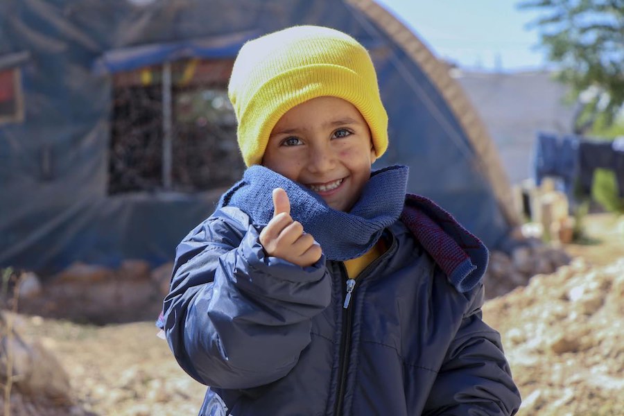 UNICEF delivers warm winter clothes to protect children in Syria from the cold.