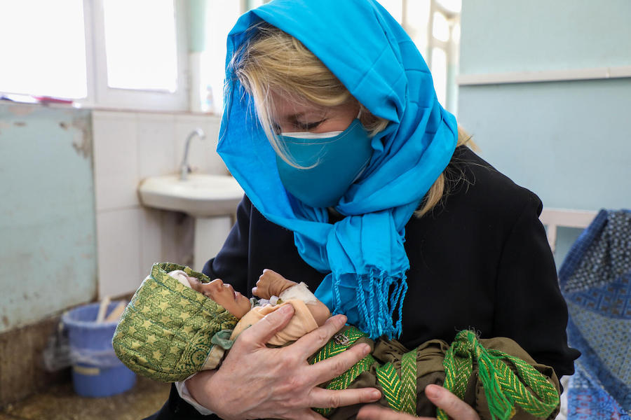UNICEF Executive Director Catherine Russell cradles 3-month-old Wahida at the UNICEF-supported inpatient department for the treatment of children with severe acute malnutrition in Kandahar, Afghanistan.