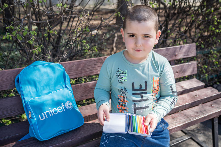 Five-year-old Ivan, a refugee from Ukraine, attends a UNICEF-supported school in Bucharest, Romania.